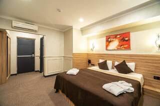 Отель Mildom City Hotel Алматы Двухместный номер Делюкс с 1 кроватью или 2 отдельными кроватями-2
